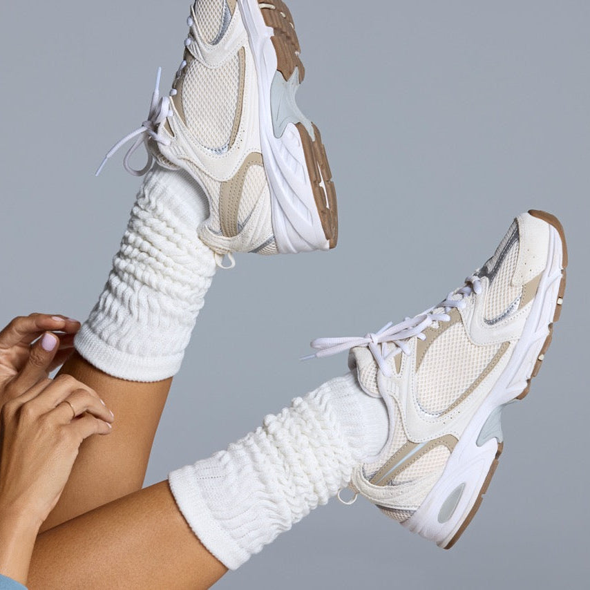 Stacy Grip Socks feature a slouchy ribbed boot.&nbsp;