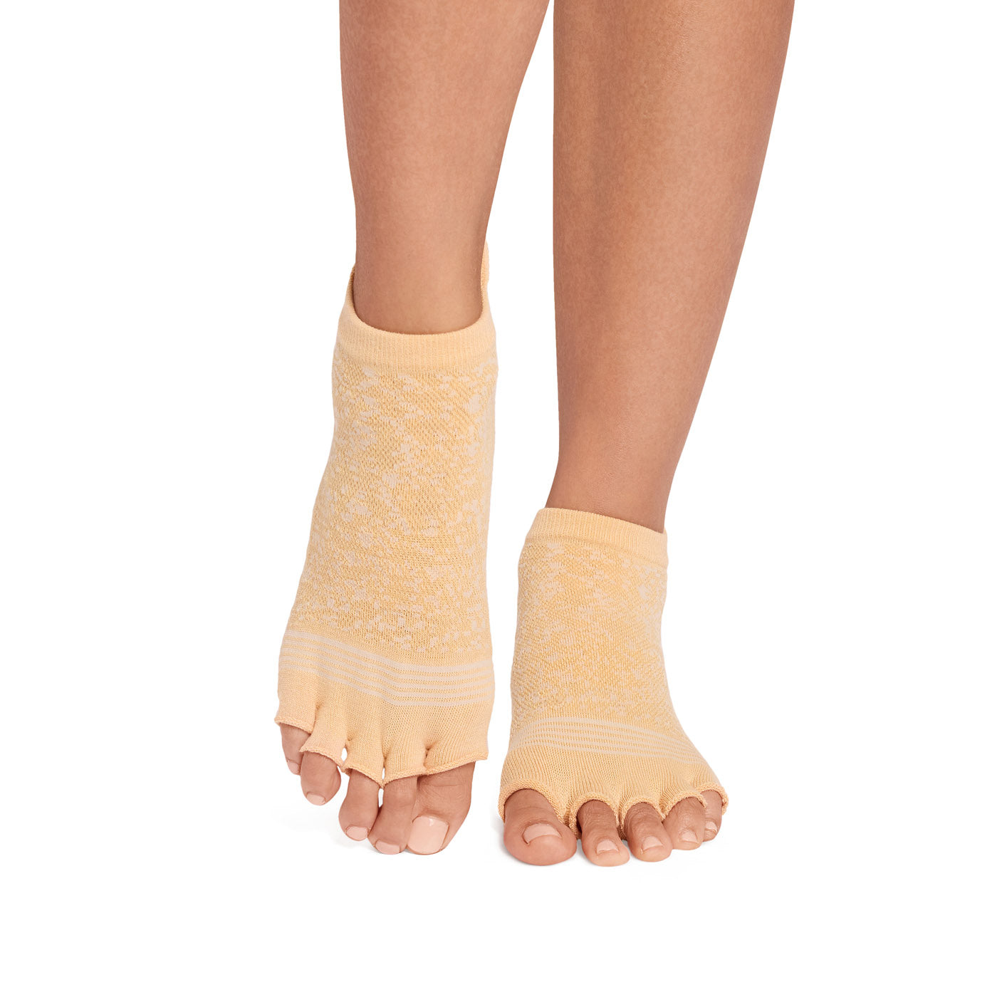 Yellow half toe socks worn on feet against a white background
