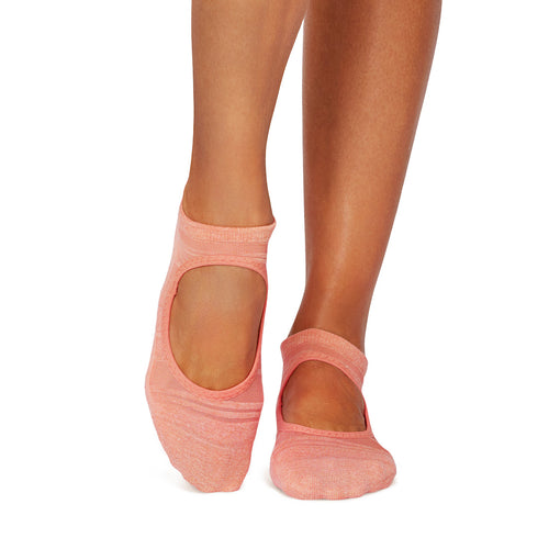 Tavi Grip Emma Breeze Socks in Hot Coral – worn on feet, front view