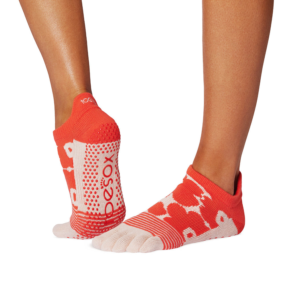 Red and white socks with brand logo on a white background