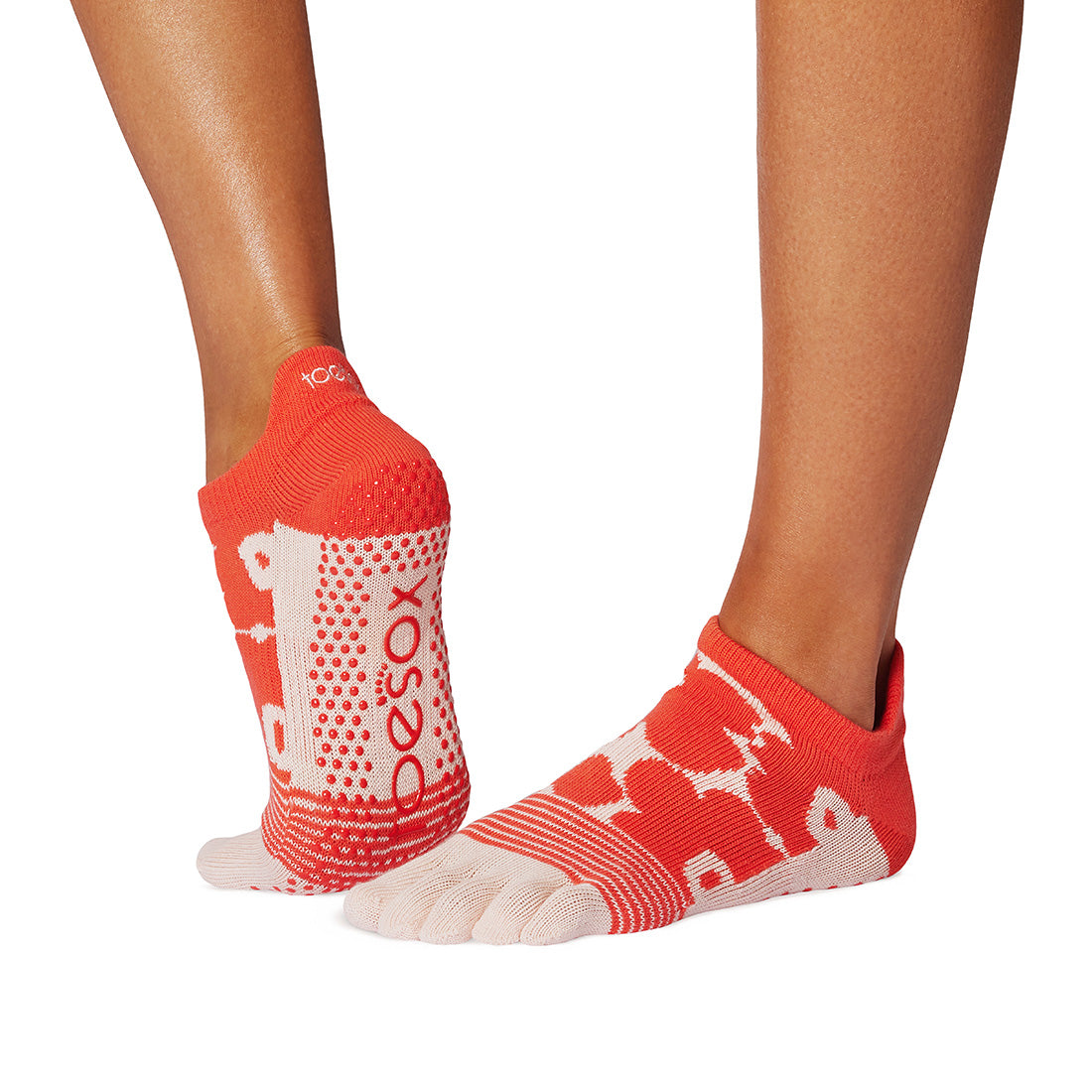 Red and white socks with brand logo on a white background