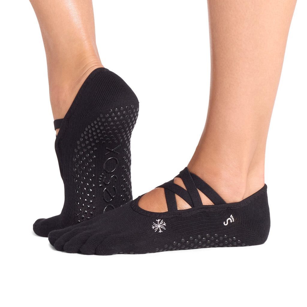 ToeSox Full Toe Elle Grip Socks in Ebony snowflake – worn on feet, side view