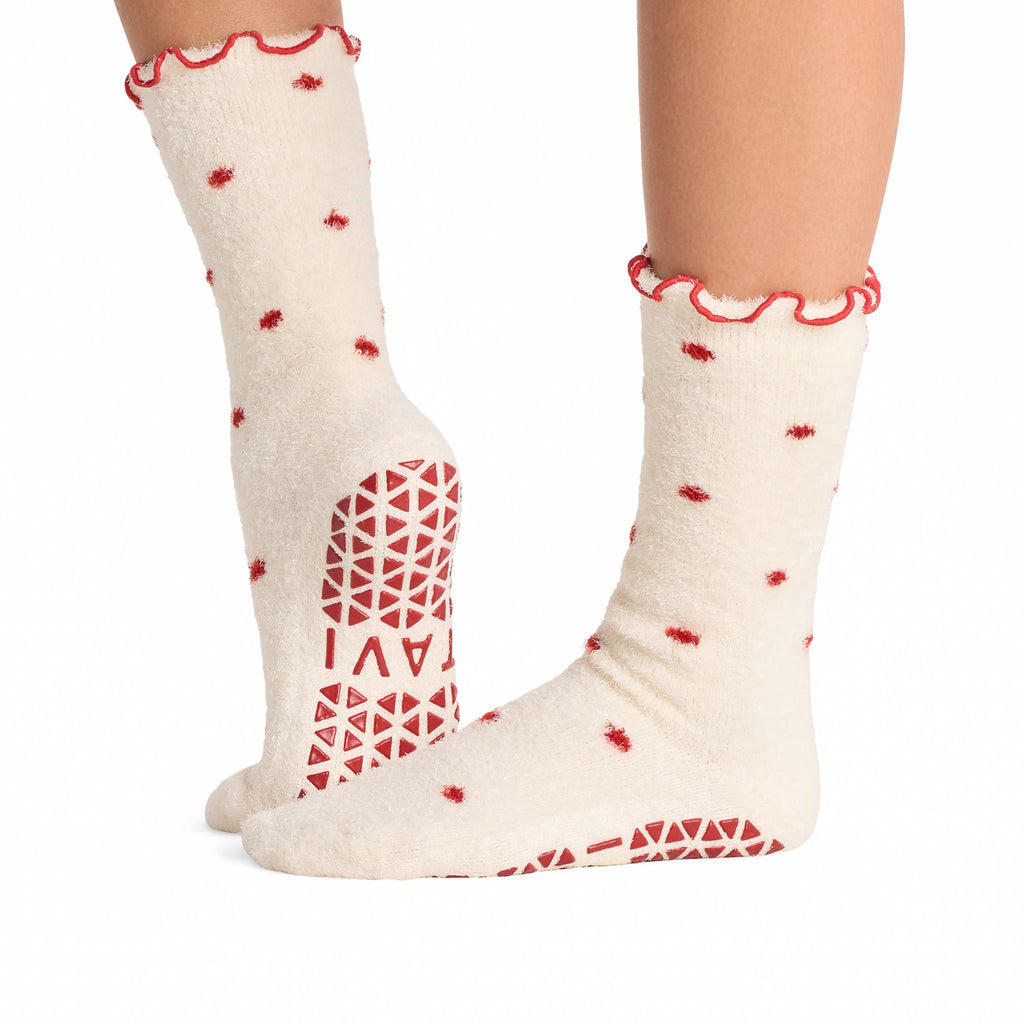 Tavi Grip Lounge Socks in Sweet dots – worn on feet, side view
