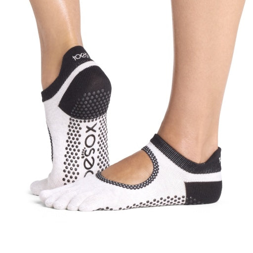 ToeSox Full Toe Bellarina Grip Socks in Ash polka dots – worn on feet, side view