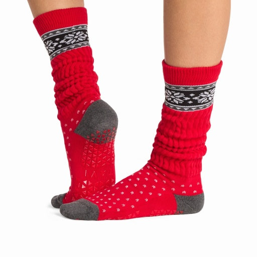 Tavi Grip Stacy Socks in Festive – worn on feet, side view