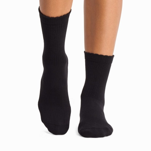 Tavi Grip Kalea Scallop Socks in Ebony – worn on feet, front view