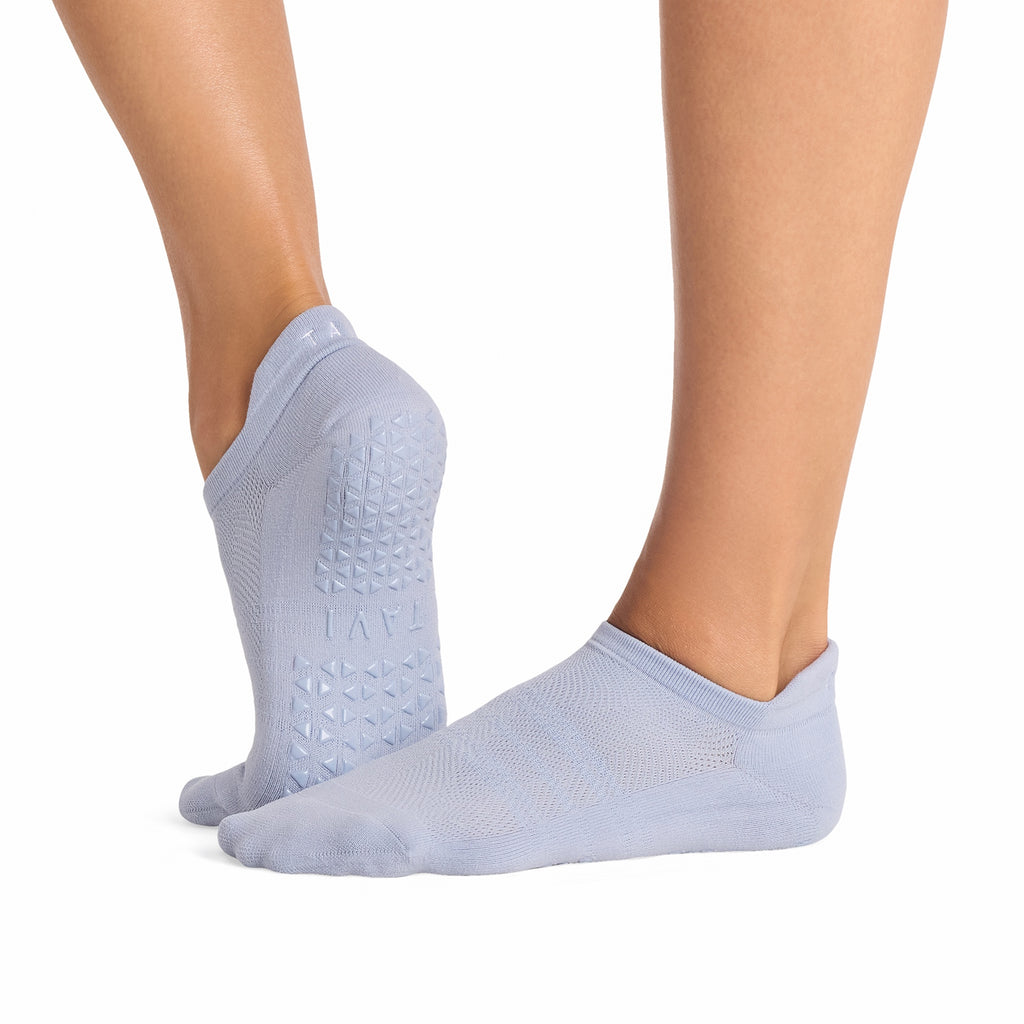 Tavi Grip Savvy Tec Socks in Sky spell – worn on feet, side view