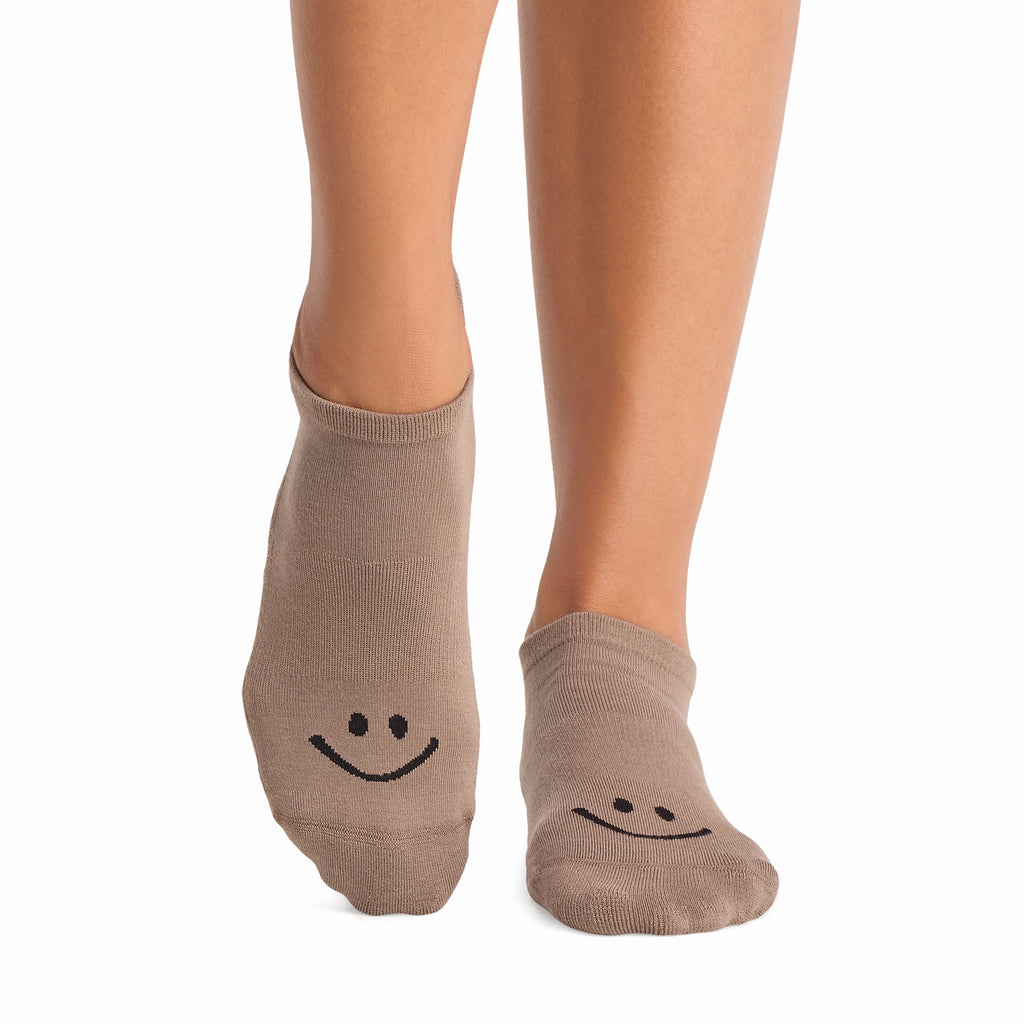 Tavi Grip Savvy Socks in Pebble – worn on feet, front view