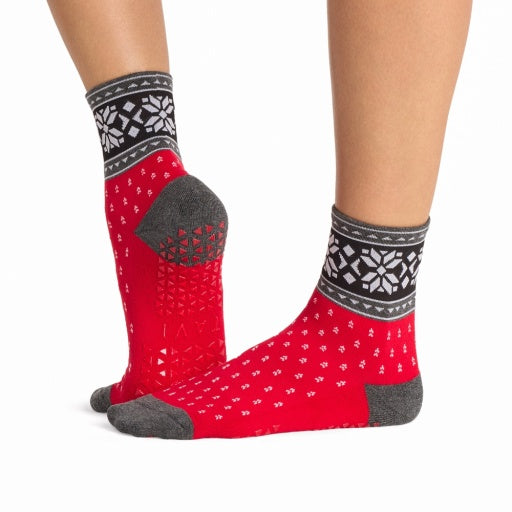 Tavi Grip Aria Stripe Socks in Festive – worn on feet, side view