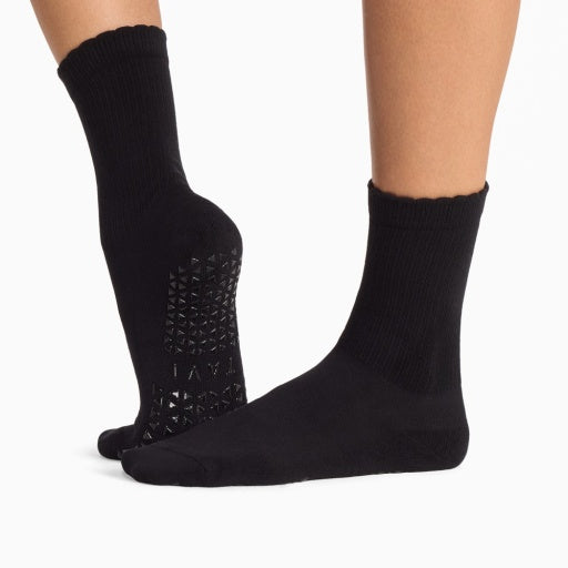 Tavi Grip Kalea Scallop Socks in Ebony – worn on feet, side view