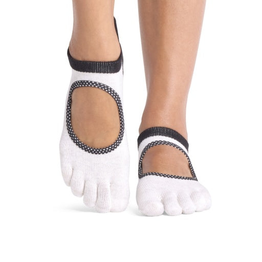 ToeSox Full Toe Bellarina Grip Socks in Ash polka dots – worn on feet, front view