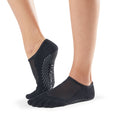 ToeSox Full Toe Luna Grip Socks in Black – worn on feet, side view